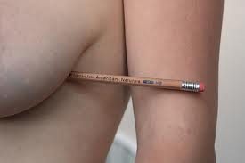 Pencil under breast
