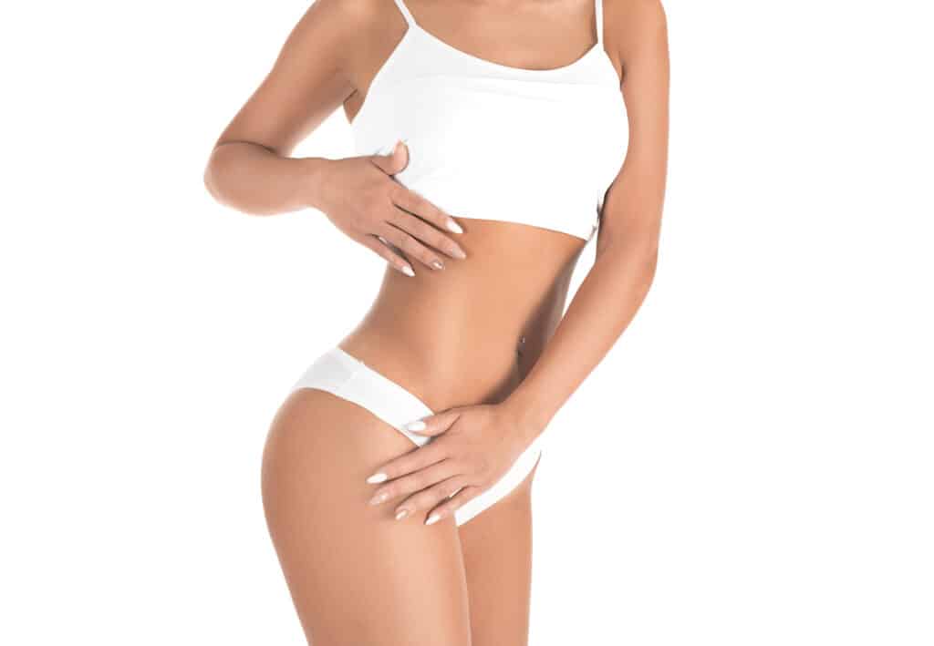 A cropped shot of a woman's torso after liposuction in Lewisville, TX